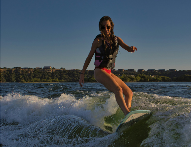 Wake Surfing Woman - Savin Lake Services
